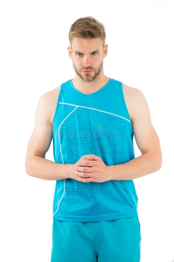 Sport is the way of his life. Man sporty outfit looks serious and strict white background. Guy muscular body live stock image Sport is the way of his life. Man sporty outfit looks serious and strict white background. Guy muscular body live stock image