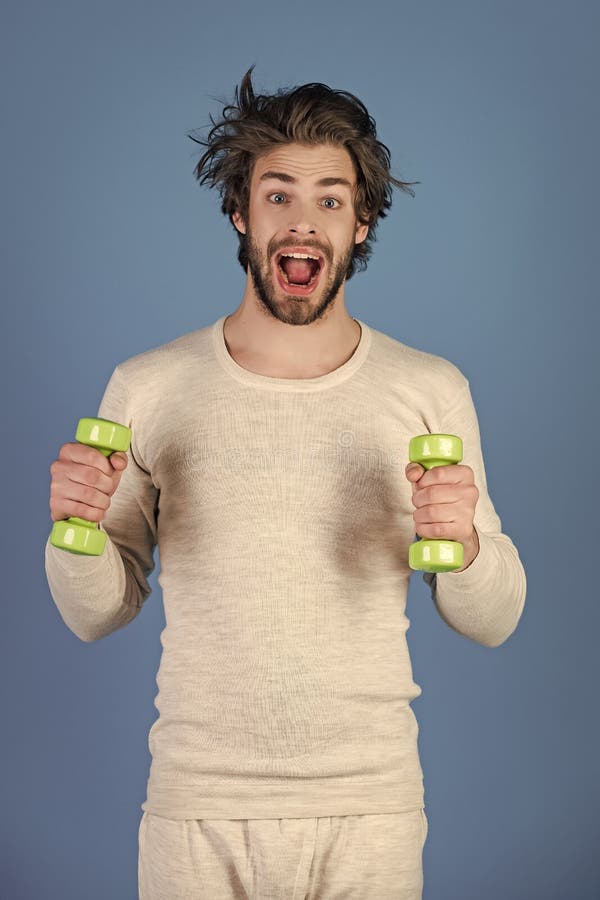 Sportif, homme sur le fond bleu photo stock Sportif, homme sur le fond bleu photo stock