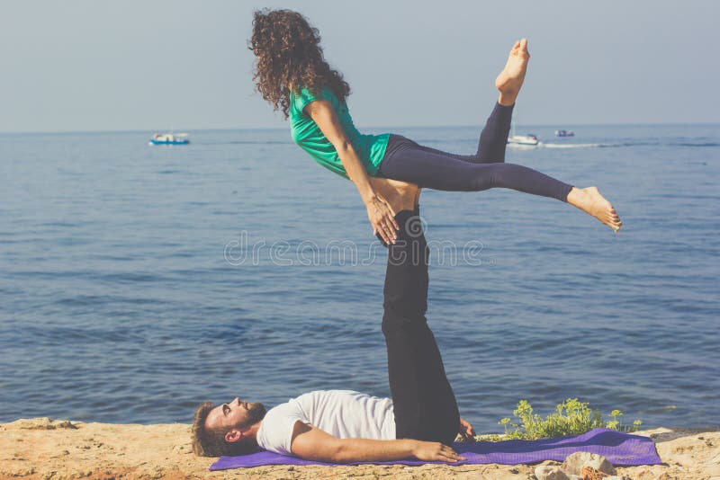 Yoga Pair Women Duo Balance Stock Photos - Free & Royalty-Free Stock Photos  from Dreamstime