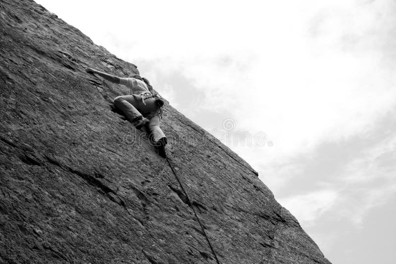 A woman sport climber in black and white 2. A woman sport climber in black and white 2