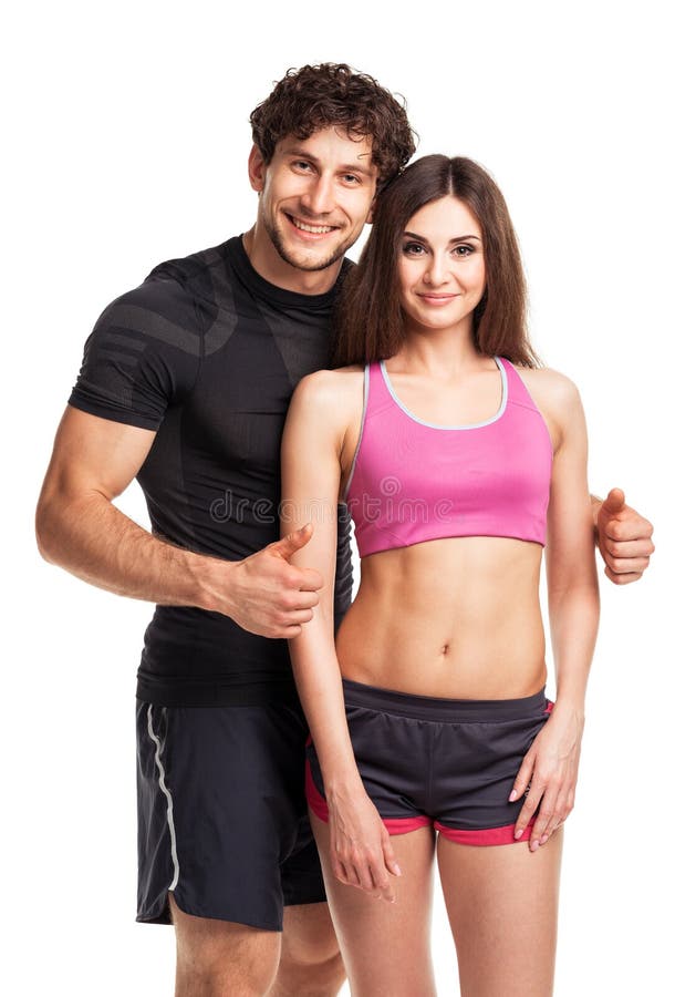 Sportpaare - Mann und Frau nach Eignung trainieren auf dem Weiß stockfoto Sportpaare - Mann und Frau nach Eignung trainieren auf dem Weiß stockfoto