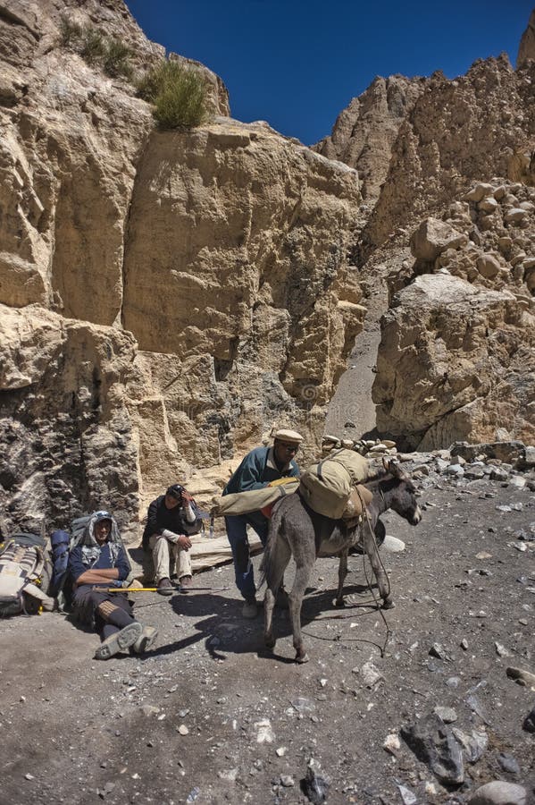 On their way to the high peaks or to the Upper Shimshal climbers and porters stop at the shelters to spend the night or rest. Usually porters carrying between 50 and 75kg for a few days continuously on a cumulative level difference of over 25,000m. Shimshal, Pakistan. On their way to the high peaks or to the Upper Shimshal climbers and porters stop at the shelters to spend the night or rest. Usually porters carrying between 50 and 75kg for a few days continuously on a cumulative level difference of over 25,000m. Shimshal, Pakistan