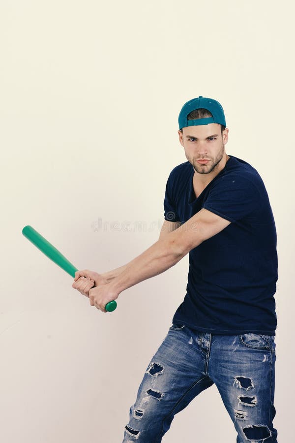 Man in Red Crew Neck Shirt and White Pants Holding Baseball Bat · Free  Stock Photo