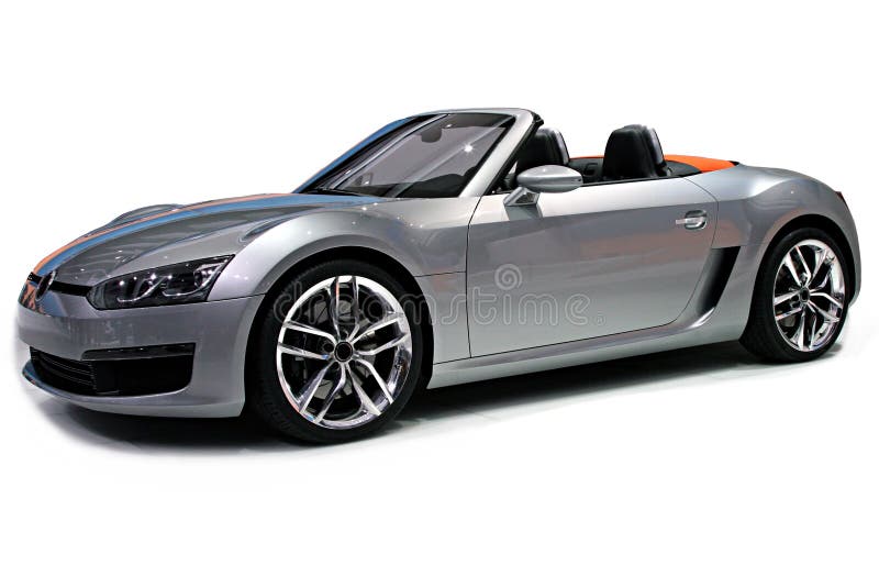 A convertible sports car isolated on a white background.