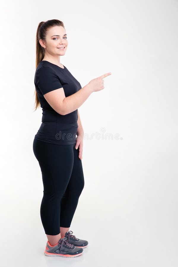 Sports fat woman pointing finger away