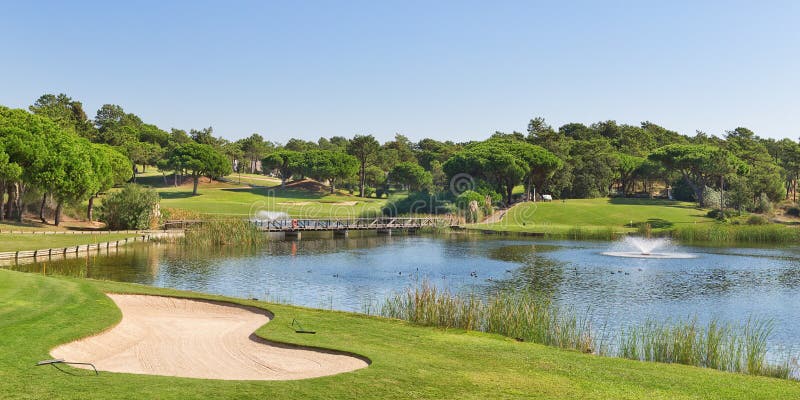 Sports golf park in Portugal. Near lake and fountain.