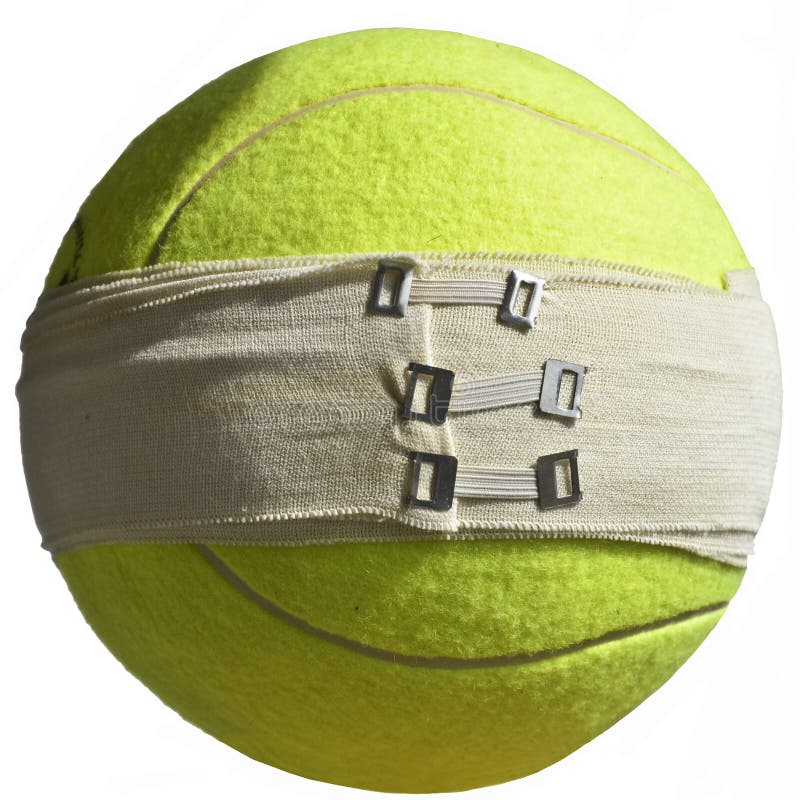 Sports Injury Concept. Isolated tennis ball with Elastic Bandages with Clip Closures on White. Sports Injury Concept. Isolated tennis ball with Elastic Bandages with Clip Closures on White