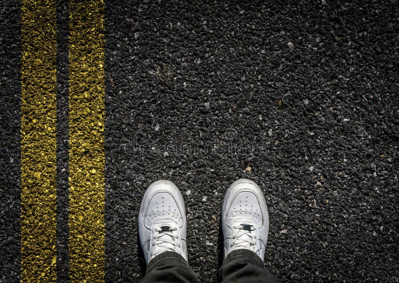 Sports Shoes on Asphalt stock image. Image of choice - 68766463