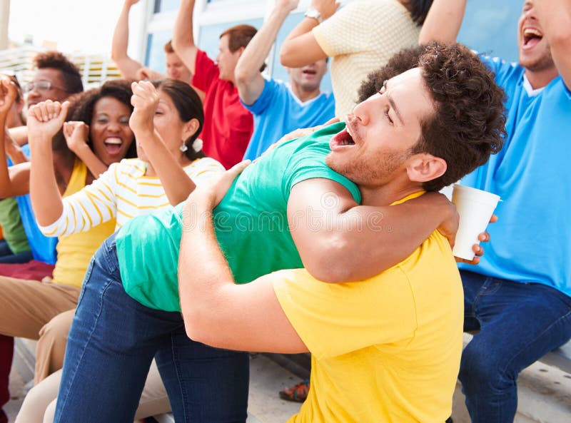 Sports Spectators In Team Colors Celebrating