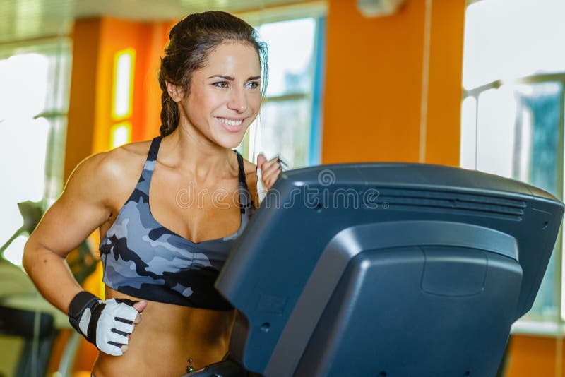 Sports woman in the gym. stock image. Image of press - 31266257