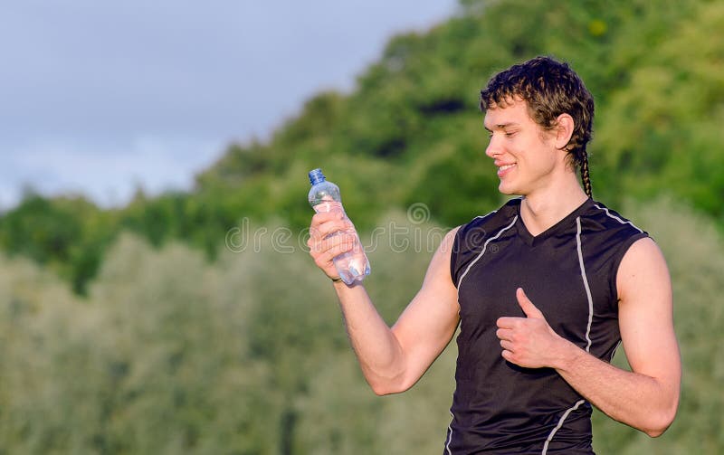 Man Drinking Bottle of Water Stock Image Image of bottle, silhouette