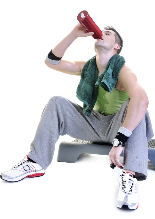 Sportsman relaxing and drinking water