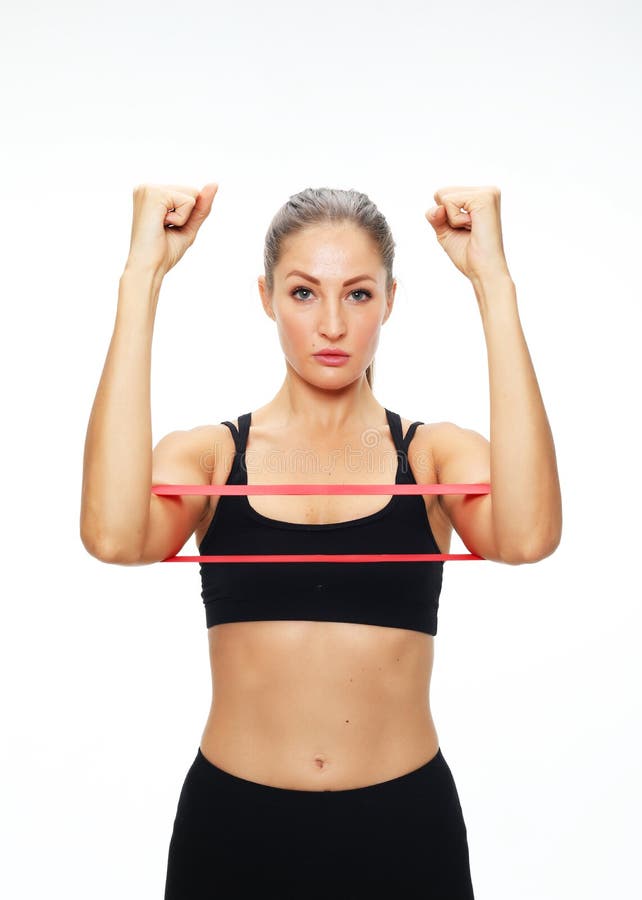 Young sporty woman with perfect body having a training with pilates ring  over white background Stock Photo by ©kanareva 232679156