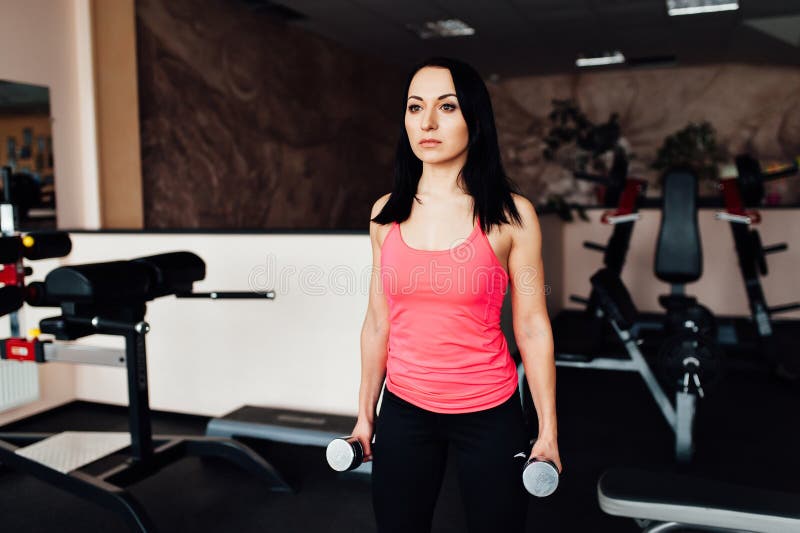 Sporty Girl Doing Exercise With Dumbbells Stock Image Image Of Hall Club 83987989