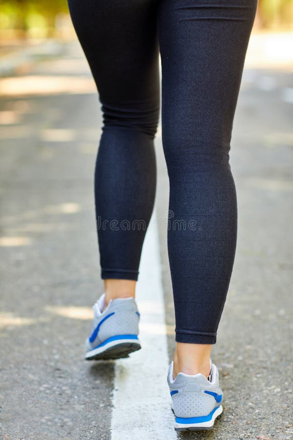 Sporty Girl Jogging Listening To Music On The Street Stock Image - Image of headphones, outdoor