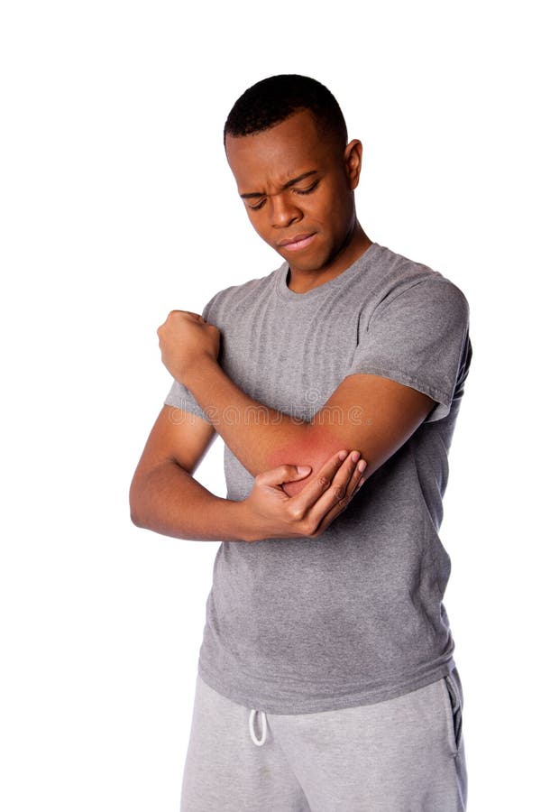 Sporty man with painful sports injury on elbow in gray shirt and sweatpants, isolated. Sporty man with painful sports injury on elbow in gray shirt and sweatpants, isolated.