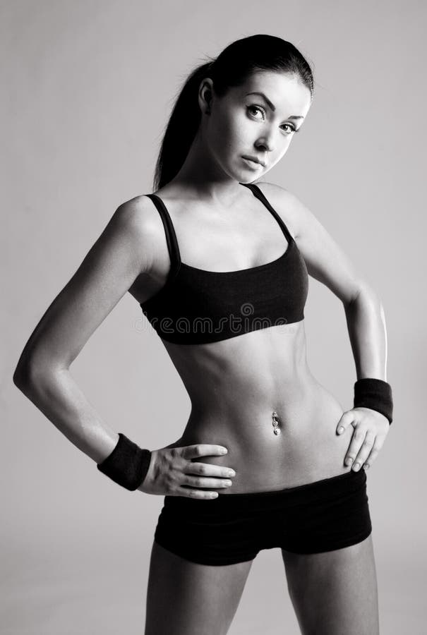 Fit Body of Beautiful, Healthy and Sporty Girl. Slim Woman Posing in  Sportswear. Stock Photo - Image of abdomen, shape: 106977298