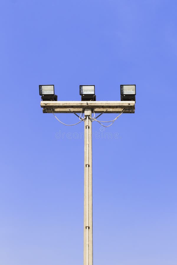 Spot Light Pole in a Stadium Against Blue Sky; Stock Photo Image of