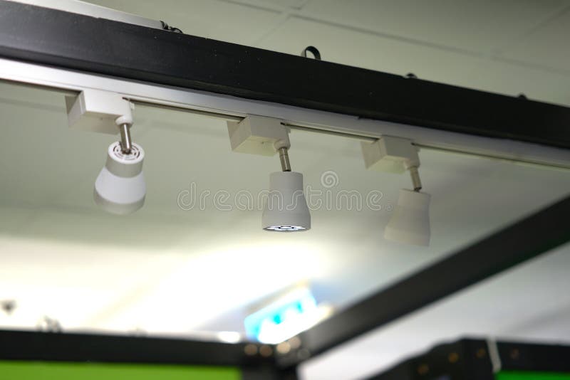 Spot Light Lamps Installed on Bar Near Ceiling Stock Photo Image of