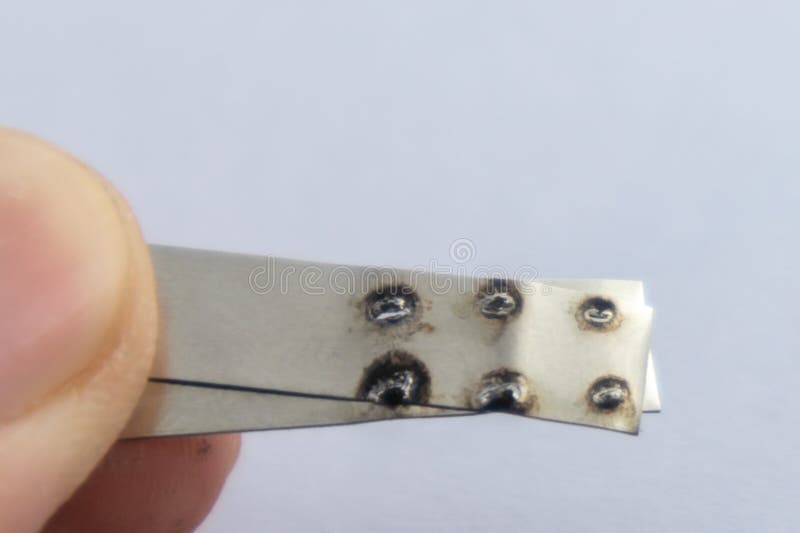 Spot Welding on Nickel Strip with Blurred Background Stock Image