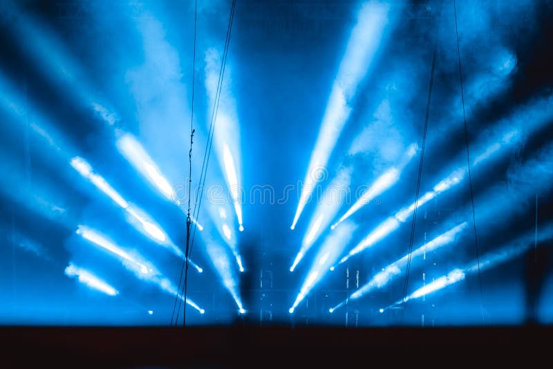 Spotlight in smoke stock photo. Image of electronics 113726554