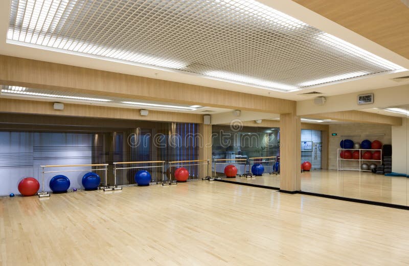 Indoor fitness room in a health club. Indoor fitness room in a health club