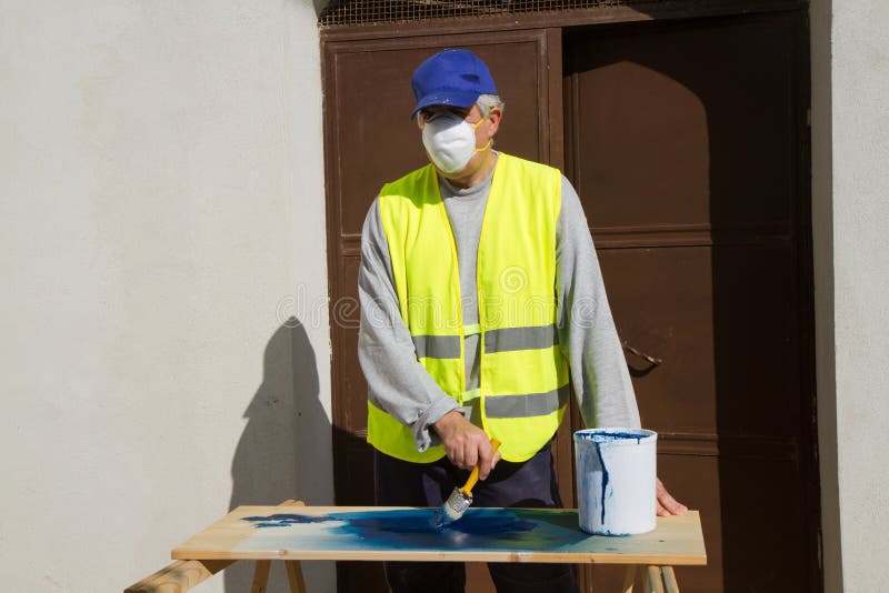 Spray painter stock image. Image of varnish, painter 69399685