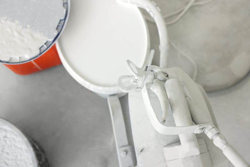 Sprayer and White Paint on Floor, Top View Stock Photo Image of