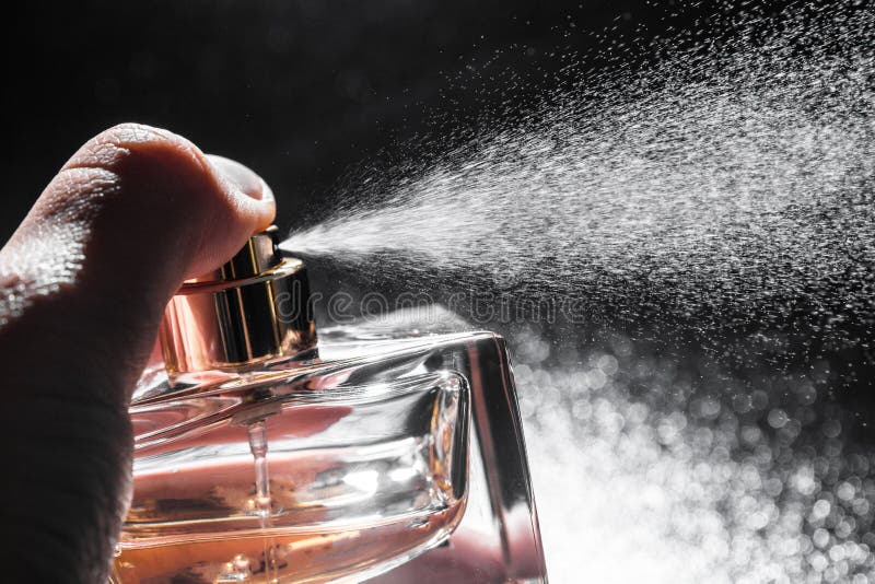 Spraying Perfume on Dark Background, Closeup Stock Image Image of