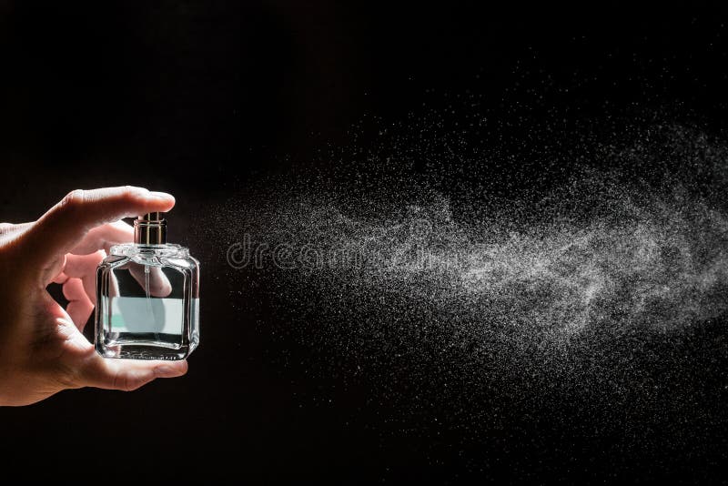 Spraying Perfume on Dark Background, Closeup Stock Image - Image of