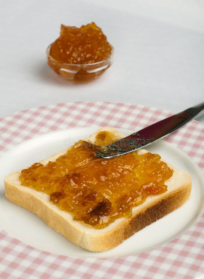 Spread jam on bread stock image. Image of bread, breakfast - 28379649
