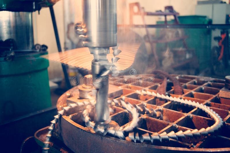 Spreading and Drilling of the Metal Part on the Machine. Stock Image
