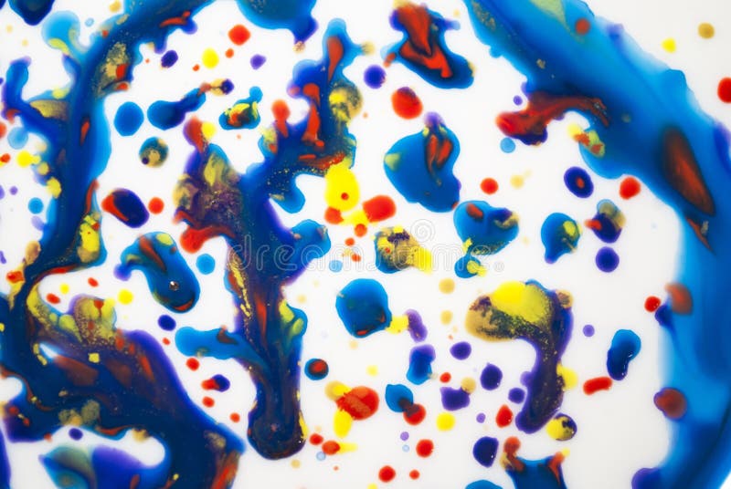 Spreading Drops of Paint, Blue, Yellow, Red. Art Background ...