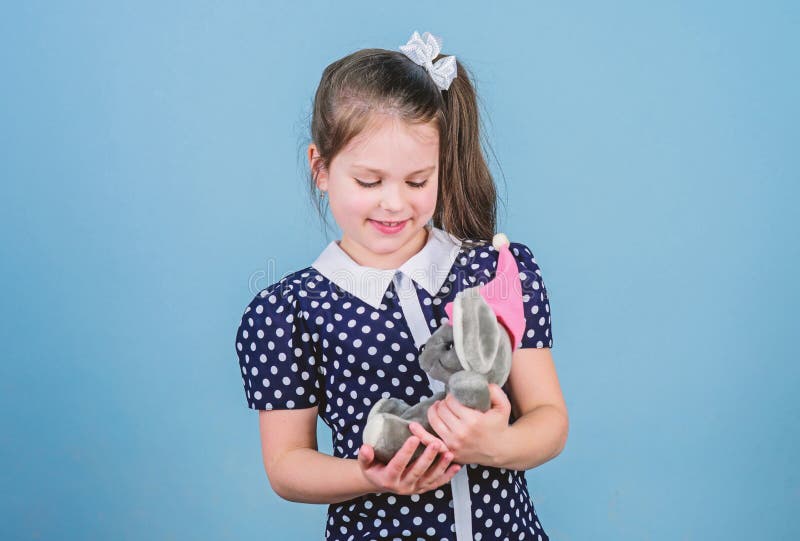Spreading love. Kid cute girl play with soft toy mouse. Happy childhood. Child care. Sweet childhood. Childhood concept stock images Spreading love. Kid cute girl play with soft toy mouse. Happy childhood. Child care. Sweet childhood. Childhood concept stock images