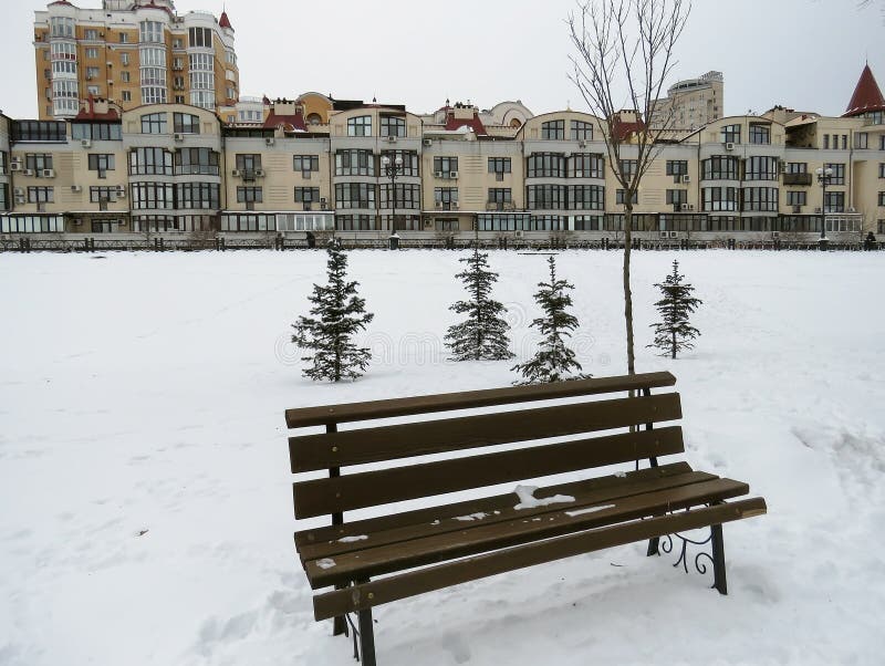 Spring city in the snow stock image