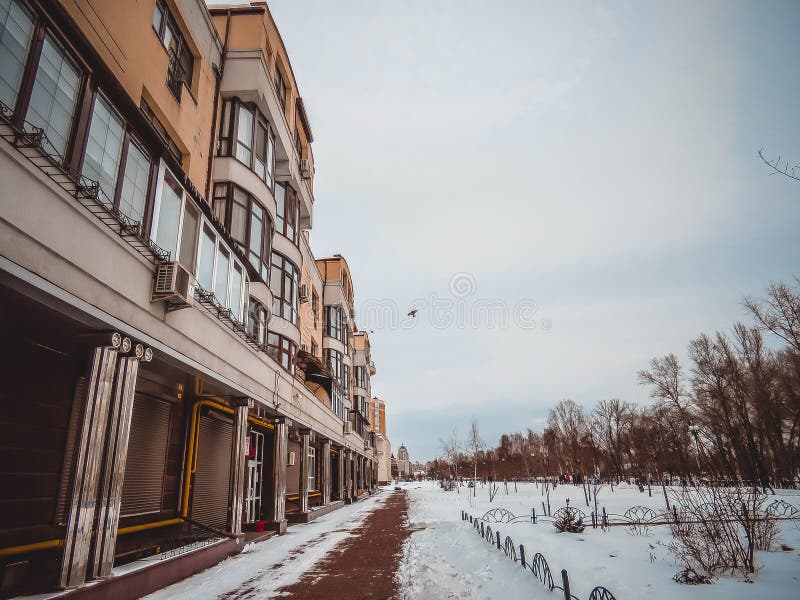 Spring city in the snow royalty free stock photos