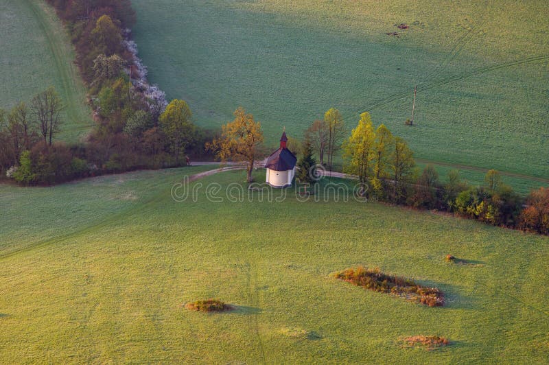 Spring green and colour country with a chapel under the. Podskalsky Rohac hill in Strazov Mountains