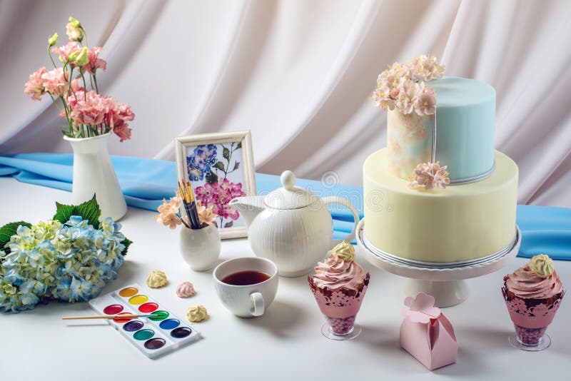Spring morning still life cake in pastel colours with flowers.