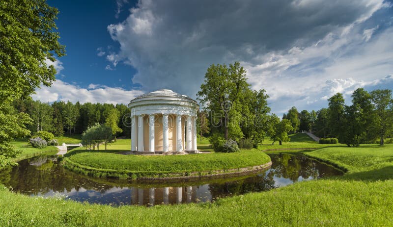 Spring park with classical building and bridge