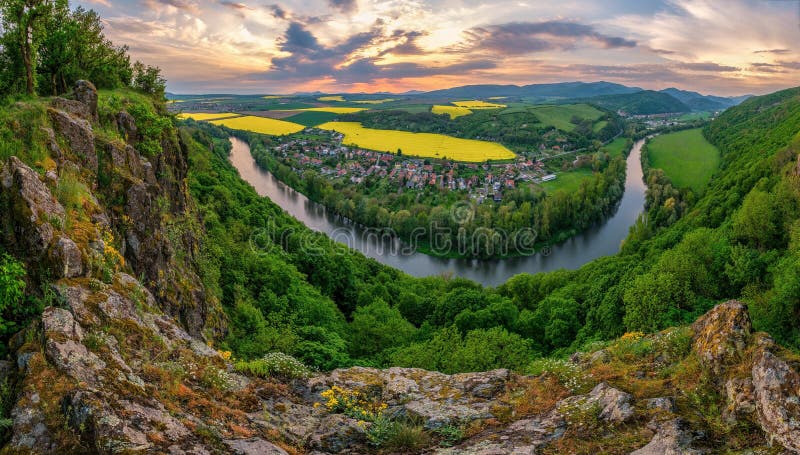 Spring sunset over meander of river Hron in Slovakia from extinct volcano