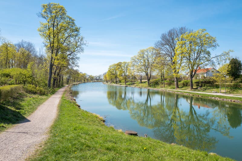 Göta Canal at Berg outside Linköping during spring in Sweden. The canal contributes to a 390 km long waterway with 58 locks connecting the Swedish west coast with the east coast.