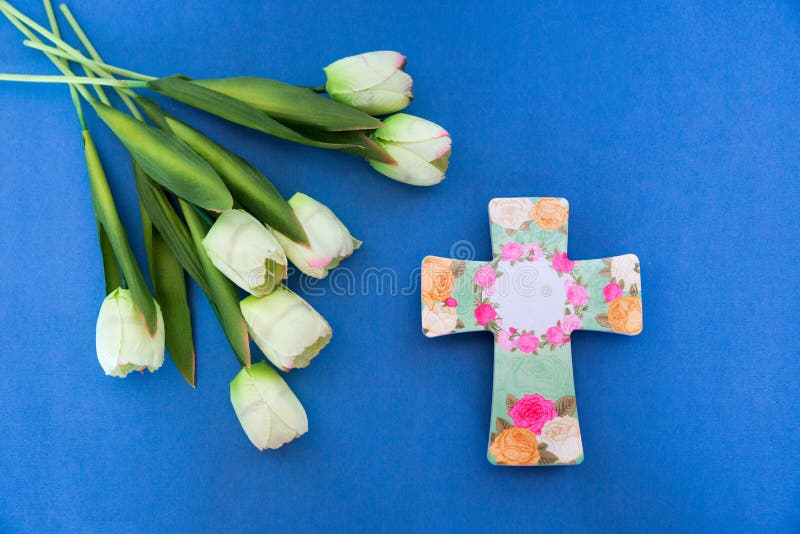 Spring Yellow Tulips and a Beautiful Ceramic Cross with a Place for
