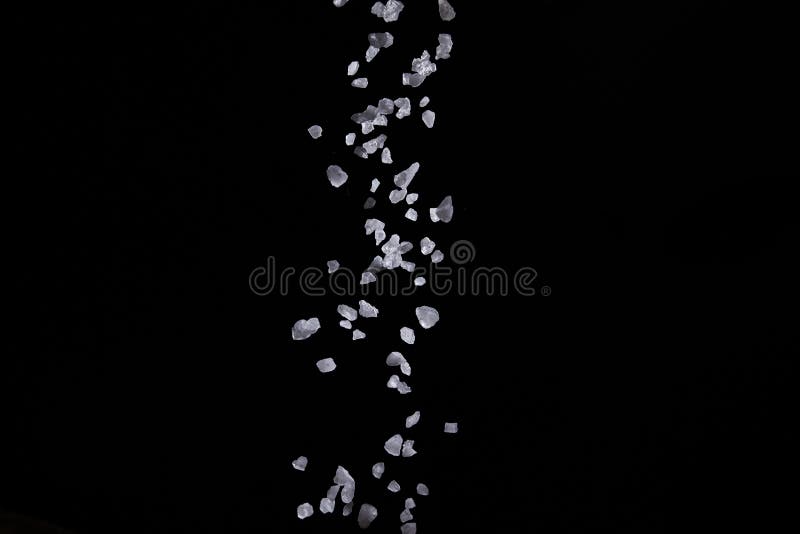 Sprinkle Salt for Seasoning on a Black Background Stock Image Image