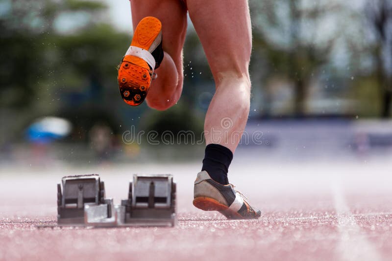 Sprinters Start in Track and Field Stock Photo Image of block