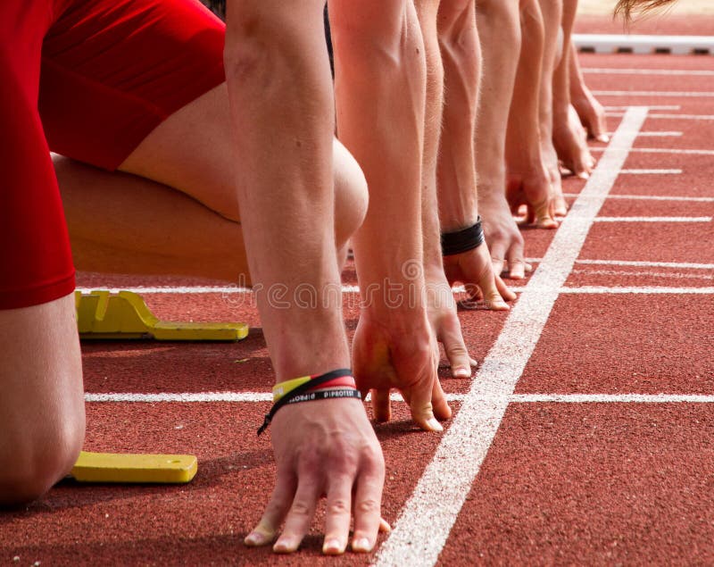 Sprinters Start in Track and Field Stock Photo Image of block