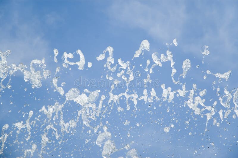 Sputtering Water at Blue Sky Stock Photo Image of blue, splashing