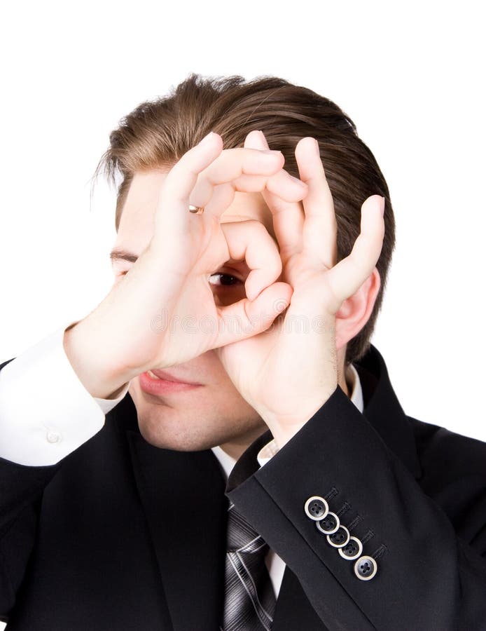 Spying businessman stock photography
