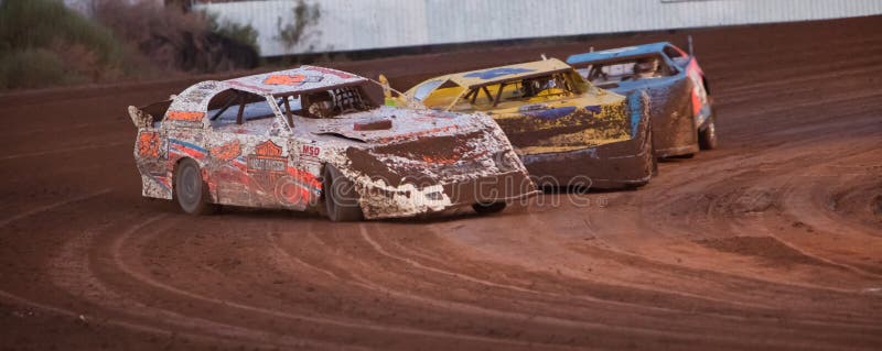 EL PASO â€“ AUGUST 19: Late Model Cars race on the dirt track at the El Paso Speedway Park on August 19, 2011 in El Paso, Texas. EL PASO â€“ AUGUST 19: Late Model Cars race on the dirt track at the El Paso Speedway Park on August 19, 2011 in El Paso, Texas.