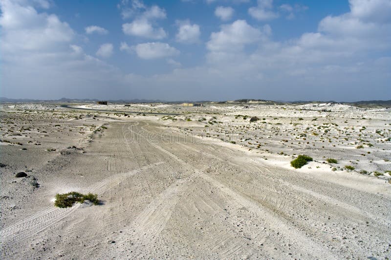 Car tire tracks in the desert, Oman. Car tire tracks in the desert, Oman