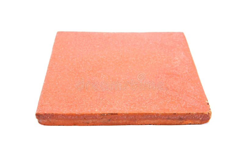 The square clay floor tile isolated on white background. Earthenware tile isolated. Clay tile isolated royalty free stock photography The square clay floor tile isolated on white background. Earthenware tile isolated. Clay tile isolated royalty free stock photography